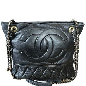 Vintage Chanel Black Quilted Lambskin Purse with logo in front and bottom
